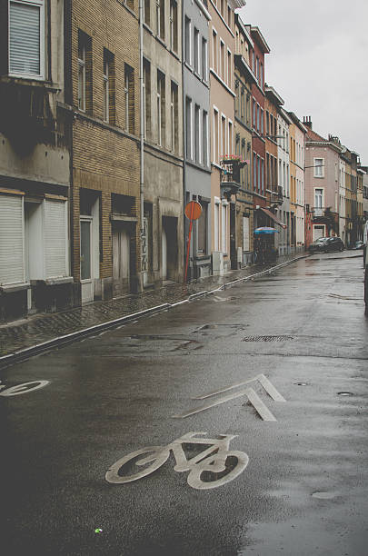 istock Biking rain street 492152216