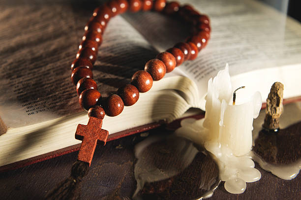 istock religious theme holy book with a cross 492155960