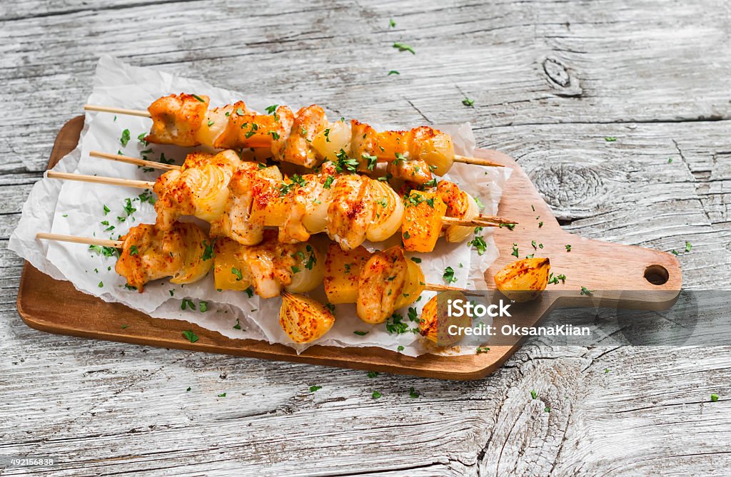 chicken kebab with pumpkin and onions chicken kebab with pumpkin and onions on a light wooden surface. Healthy food 2015 Stock Photo