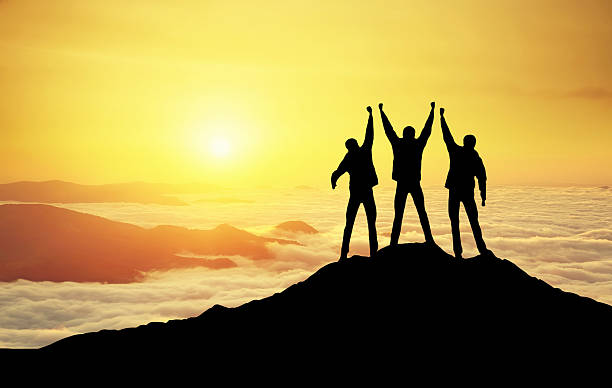 istock Silhouettes of team 492157082