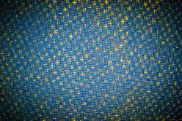 Grunge vignetted textile background - blue colored Grunge vignetted textile background - blue colored textured arts and entertainment on gunny stock pictures, royalty-free photos & images