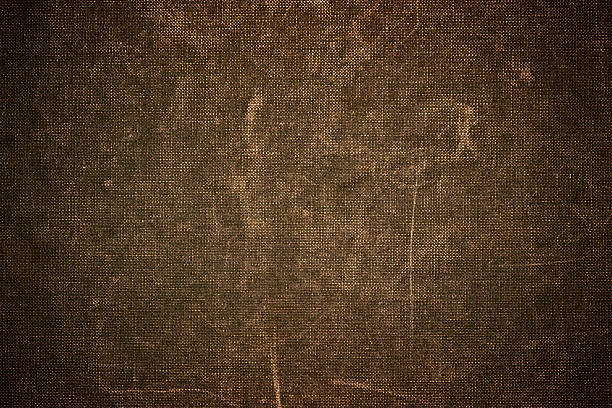 Grunge vignetted textile background - brown colored Grunge vignetted textile background - brown colored textured arts and entertainment on gunny stock pictures, royalty-free photos & images