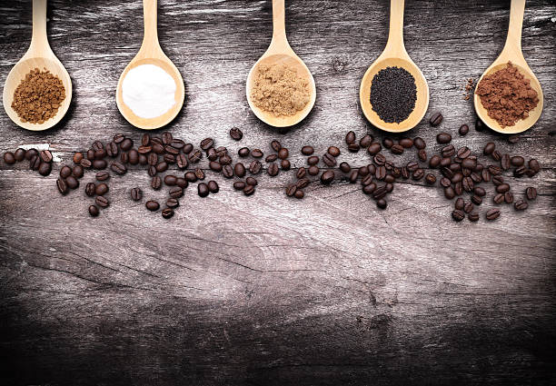 istock grated coffee in spoon on roasted coffee beans background 492159206