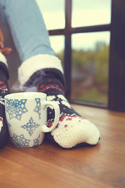 istock Close up on feet. Winter and Christmas holidays. 492159242