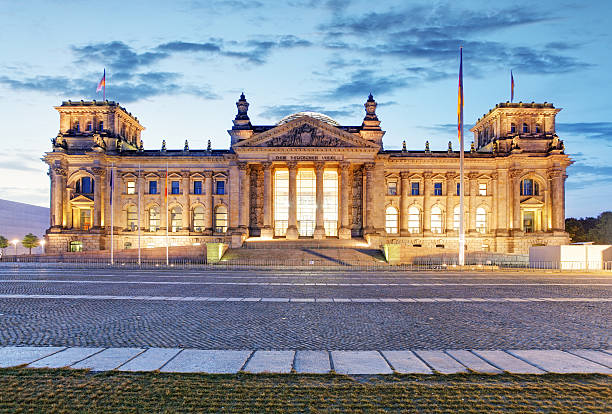 istock Berlin Reichstag. Image of illuminated Reichstag Building in Berlin, Germany. 492159796
