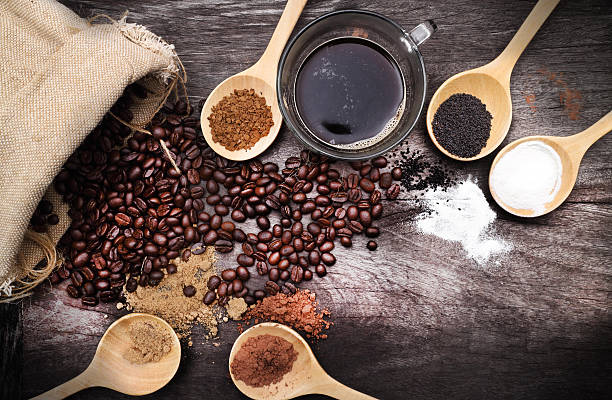istock grated coffee in spoon on roasted coffee beans background 492159812
