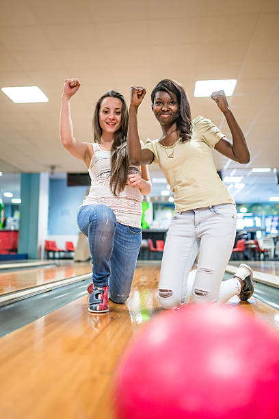 istock throwing the bowling ball in a pub 492159890