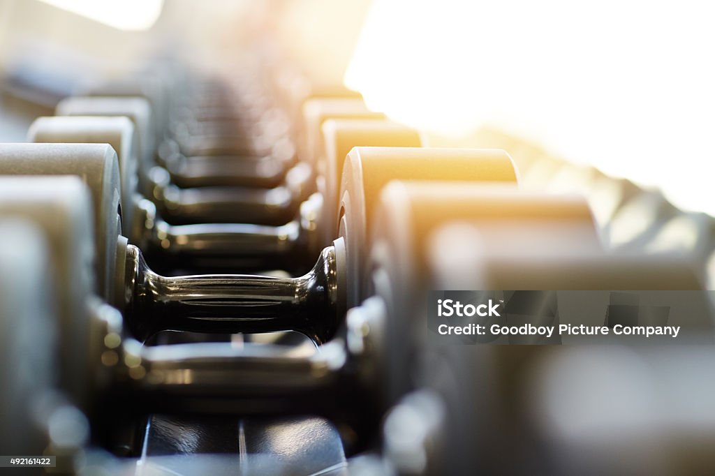 Give your body a lift Shot of the interior of a health clubhttp://195.154.178.81/DATA/i_collage/pu/shoots/805713.jpg Exercise Equipment Stock Photo