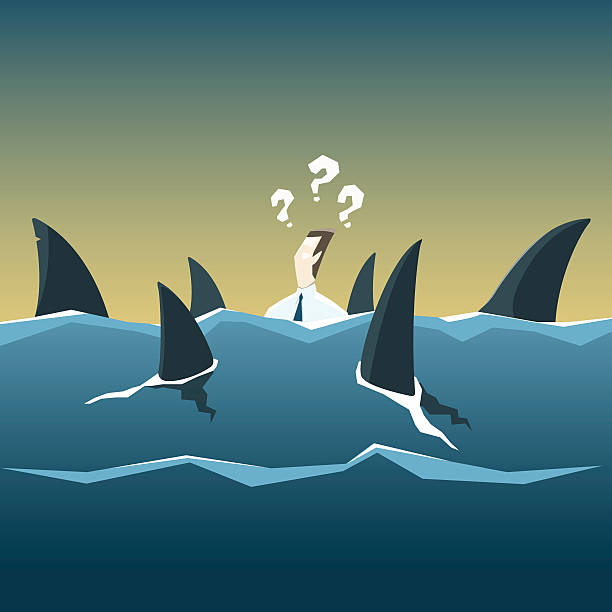 istock Sharks attack businessman who is drowning in the sea 492162162