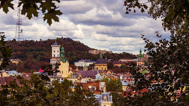 istock Downtown of Lviv in frame from leaves, Vintage processing 492162202