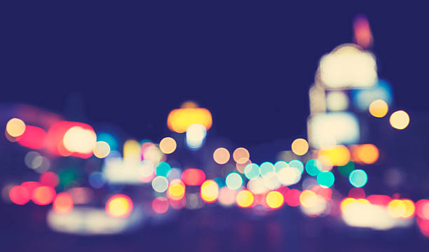 istock Vintage toned blurred city lights at night. 492188848