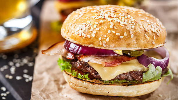 istock Delicious burger on wooden board 492189274