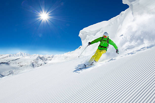 istock Skier skiing downhill in high mountains 492189880