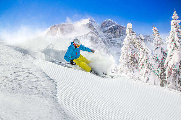 istock Skier skiing downhill in high mountains 492190368