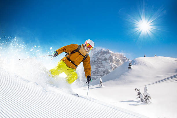 istock Skier skiing downhill in high mountains 492190890