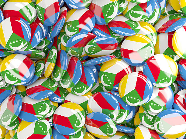 istock Background with round pins with flag of comoros 492192724