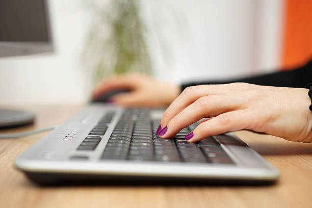 istock Woman is working on personal computer at home 492195084