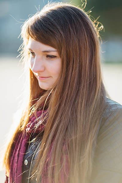 istock Girl enjoying her time outside in park with sunset 492195606