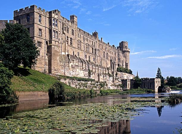 Castle and River Avon, Warwick, UK. Warwick, United Kingdom - June 10, 1992:  View of Warwick Castle on the banks of the river Avon, Warwick, Warwickshire, England, UK, Western Europe. warwick uk stock pictures, royalty-free photos & images