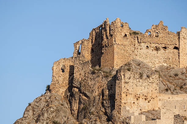 Castle of Hurman (Maravuz) in Kahramanmaras, Turkey.The castle is an antique Roman castle and is placed on the right side of frame.The left side and upper part of horizontal frame is blue clear sky.No people are seen.Shot with a full frame DSLR camera and a telephoto lens.