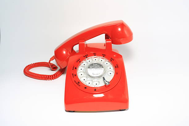 istock retro  rotary dial phone pick up by hollow man 492197587
