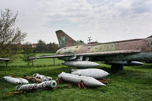 istock Old fighter plane with a variety of bombs 492198945