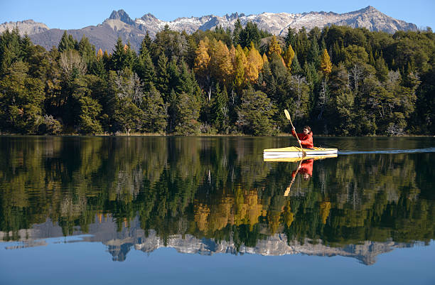 Kayaking travesia in Patagonia Kayaking in the lakes of Patagonia. bariloche stock pictures, royalty-free photos & images