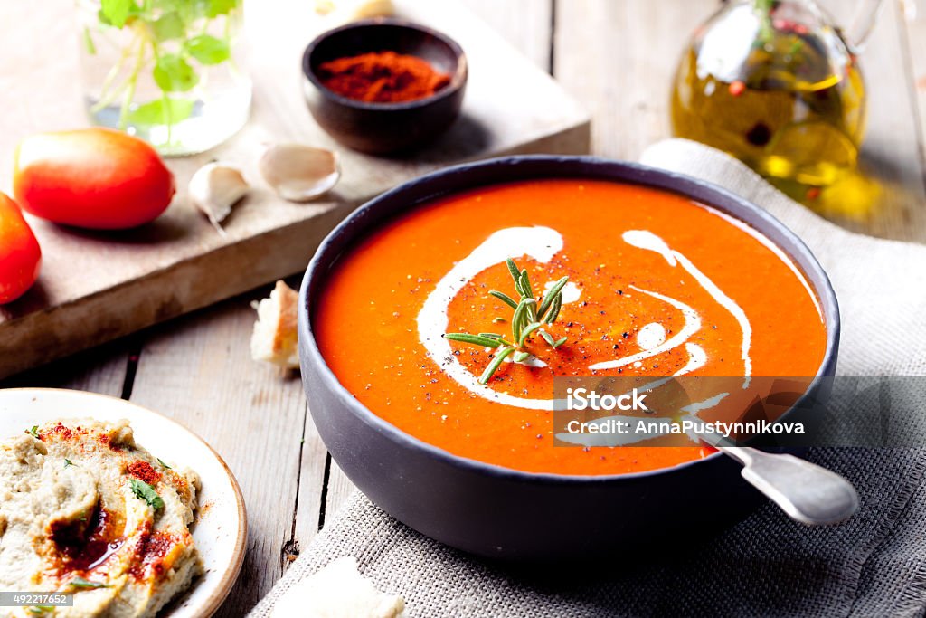 Tomato, red pepper soup, sauce with rosemary Tomato, red pepper soup, sauce with olive oil, rosemary and smoked paprika Soup Stock Photo