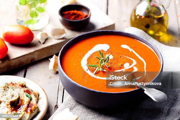 Tomato Red Pepper Soup Sauce With Rosemary Stock Photo - Download Image Now - Soup, Paprika, Dinner