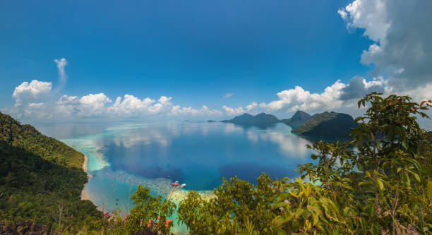 istock Panorama: Corals reef and islands seen from high angle 492218202