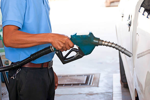 istock Male hand holding green pump 492218692