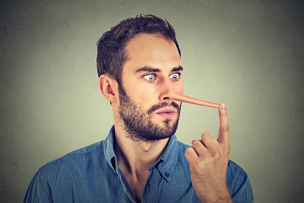 Man with long nose shocked surprised Man with long nose isolated on grey wall background. Liar concept. Human face expressions, emotions, feelings. liar stock pictures, royalty-free photos & images