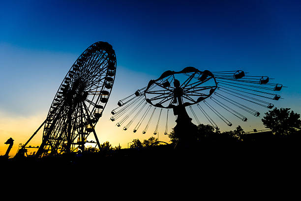 istock Carousel and Ferris Wheel at Amusement Park 492226866
