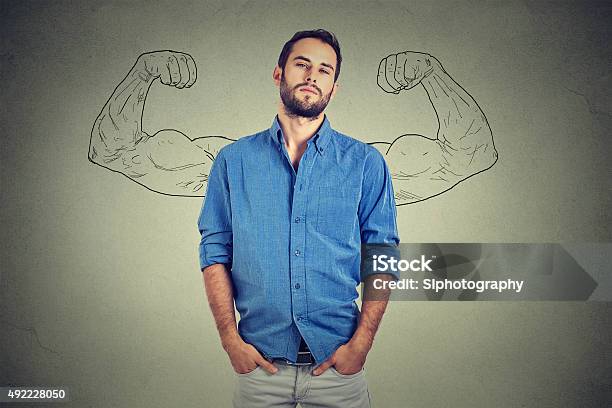 Strong Man Self Confident Young Entrepreneur Stock Photo - Download Image Now - Arrogance, Men, Showing Off
