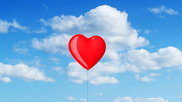 istock red heart shaped balloon in the sky 492229170