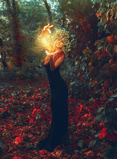 istock terrific young witch conjures in the forest 492229908