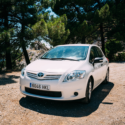 Portocolom, Spain - 19th February, 2019: Toyota Corolla Touring Sports hybrid car stopped on a parking. The Corolla is the most popular car model in the world.