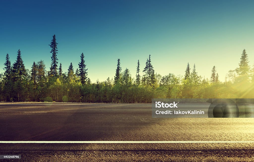 asphalt road in forest asphalt road in mountain forest Side View Stock Photo