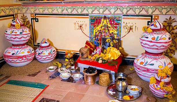 istock devotion and invitation for lord ganesha at an indian wedding 492250920