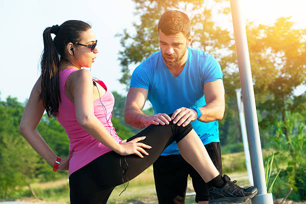 istock Young athletic couple exercising 492250990