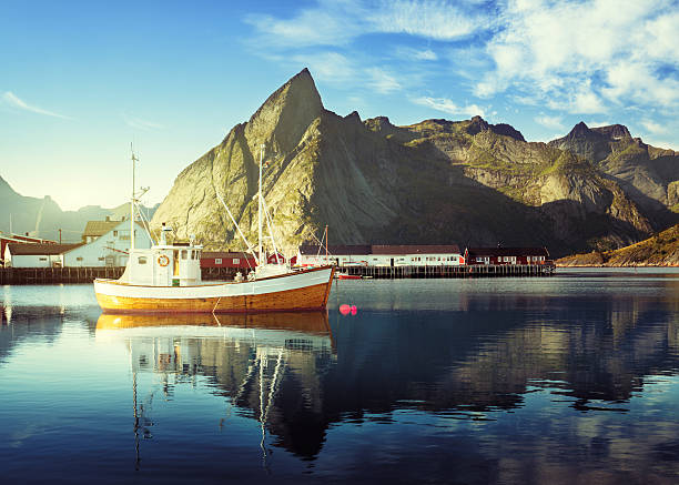 istock sunset - Reine, Lofoten islands, Norway 492251382