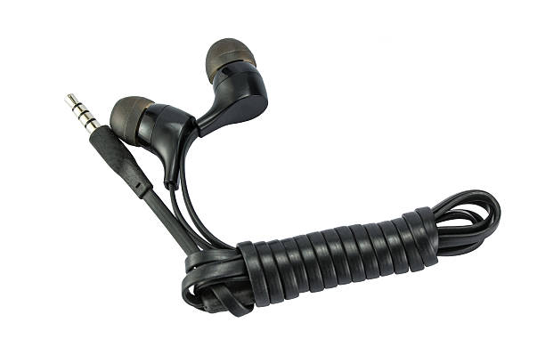 istock Earphones with black line keep roll on a white background 492254106