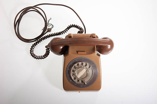 istock Retro rotary telephone on white background 492254752