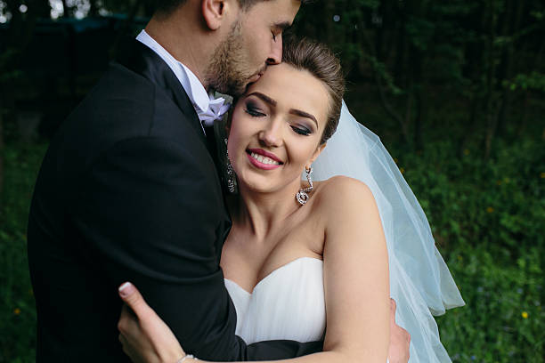istock Beautiful wedding couple on nature 492258100