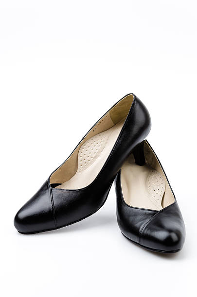 istock leather black shoes women isolated white background 492258511