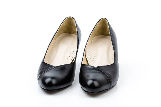 istock leather black shoes women isolated white background 492258527