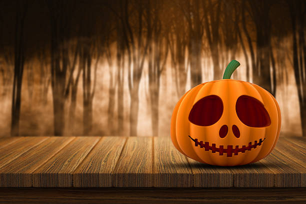 istock 3D Halloween pumpkin on a wooden table 492258568
