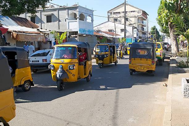 Hell-Ville, Madagascar - December 19, 2015: Traditional rickshaw customers waiting at the Hell-Ville, Nosy Be Island, Madagascar.