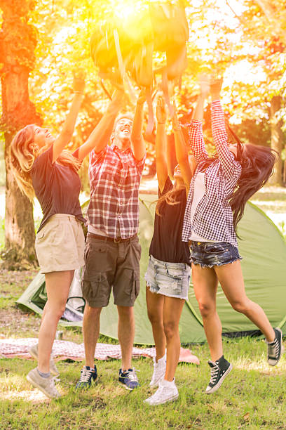 istock Group of friends having fun at camping 492258864