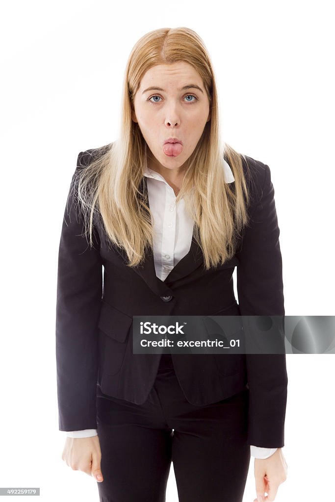 Empresaria sacando su lengua - Foto de stock de 25-29 años libre de derechos